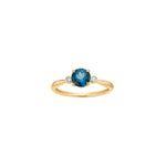 14ct. gold ring w/London topaz /0,08ct WSI