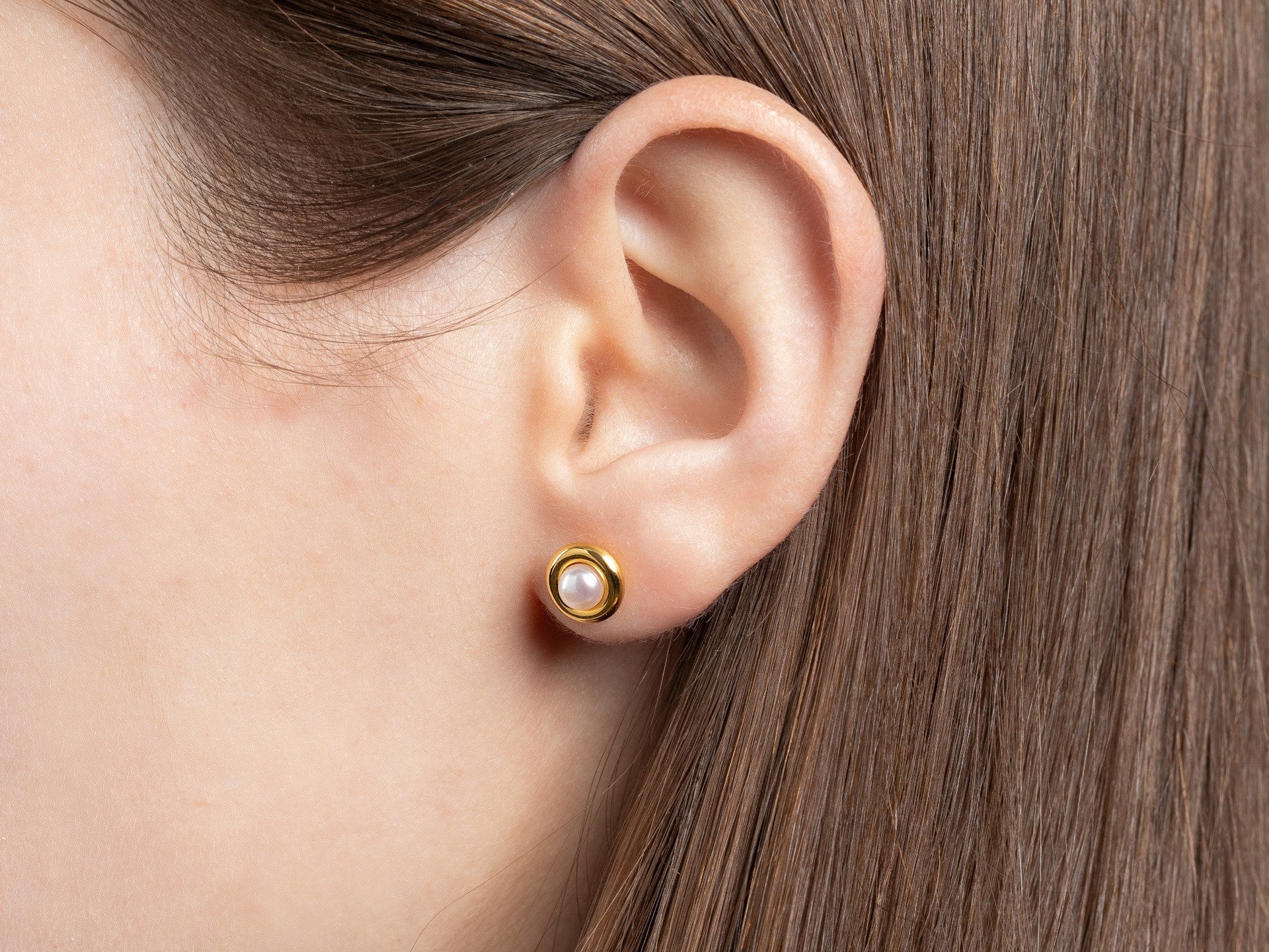 925/- earstud, gp pol., pearls 1,03ct