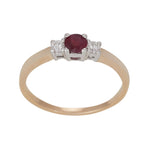 14 kt. gold ring w/ 0.116ct TW/SI and ruby