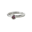 Silver ring w/purple cz