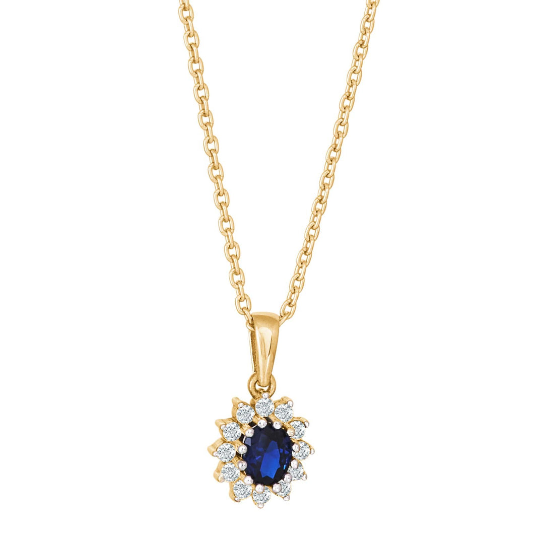 8ct. gold pendant roset w/synt. sapphire and cz in