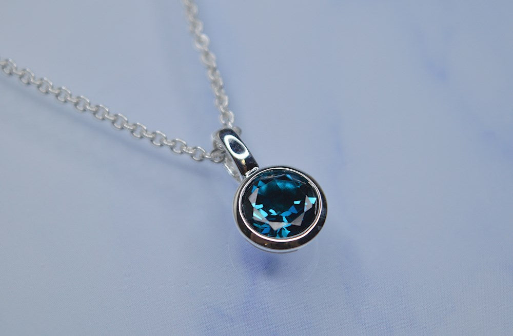 925/- Vedhæng blank, topas London Blue 1,2ct
