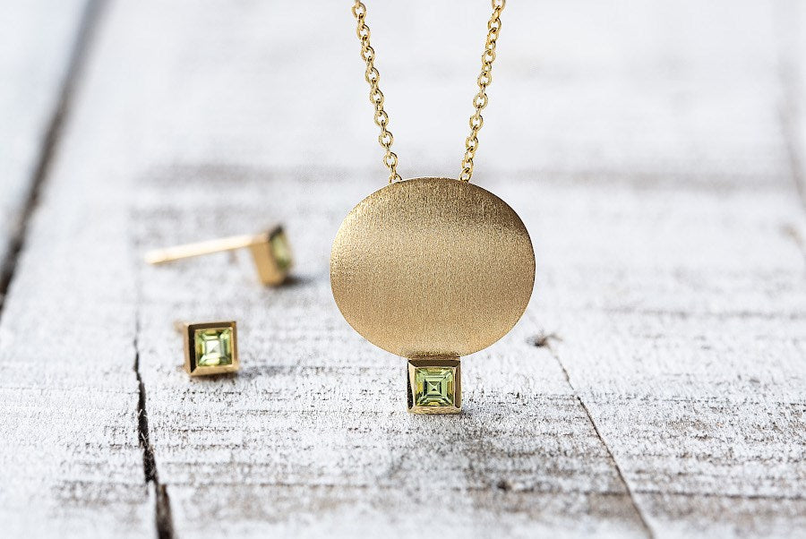 750/- Anhänger matt./Poliert, Peridot 0,17ct