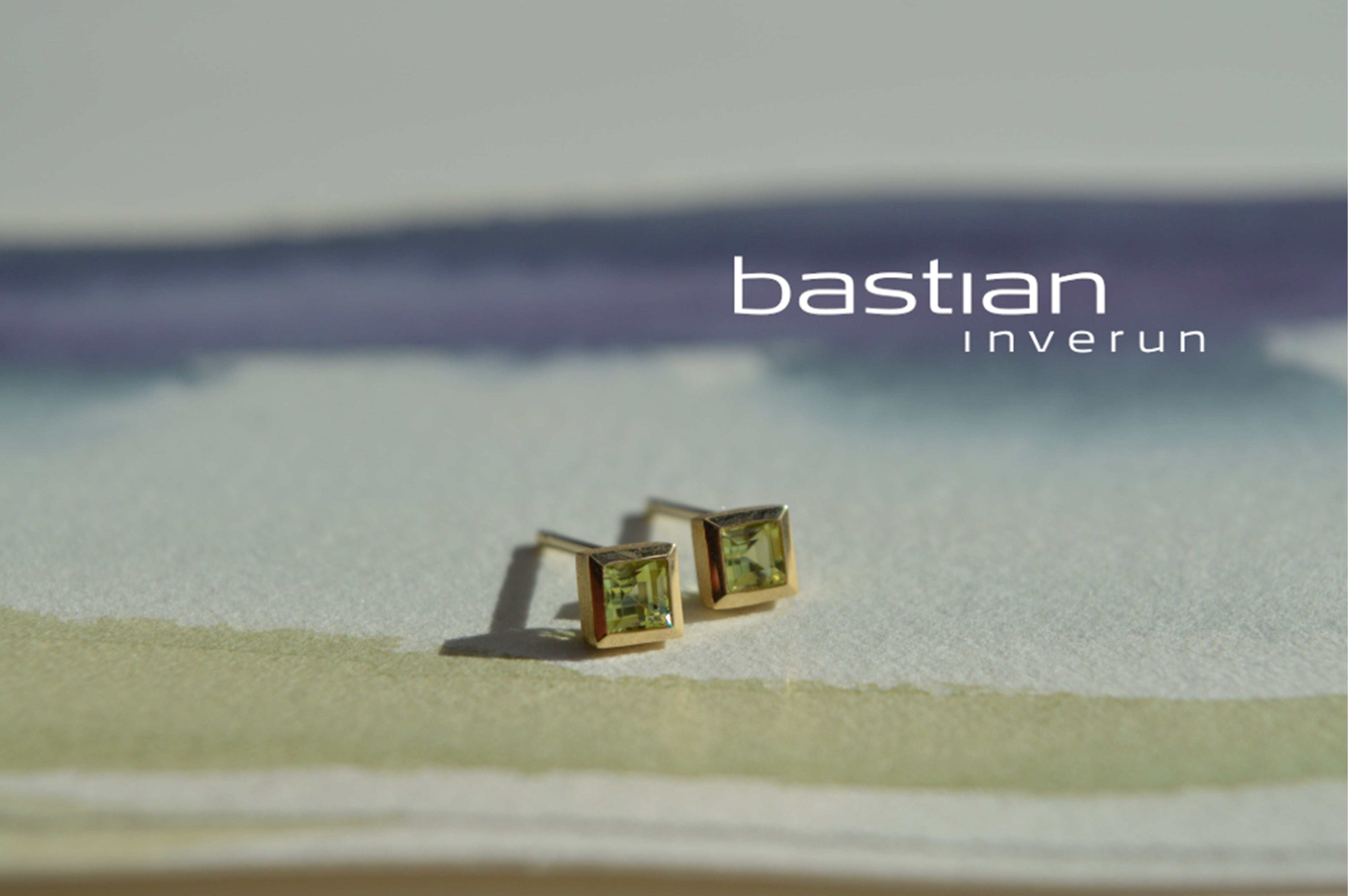 750/- Ohrstecker matt./Poliert, Peridot 0,30ct