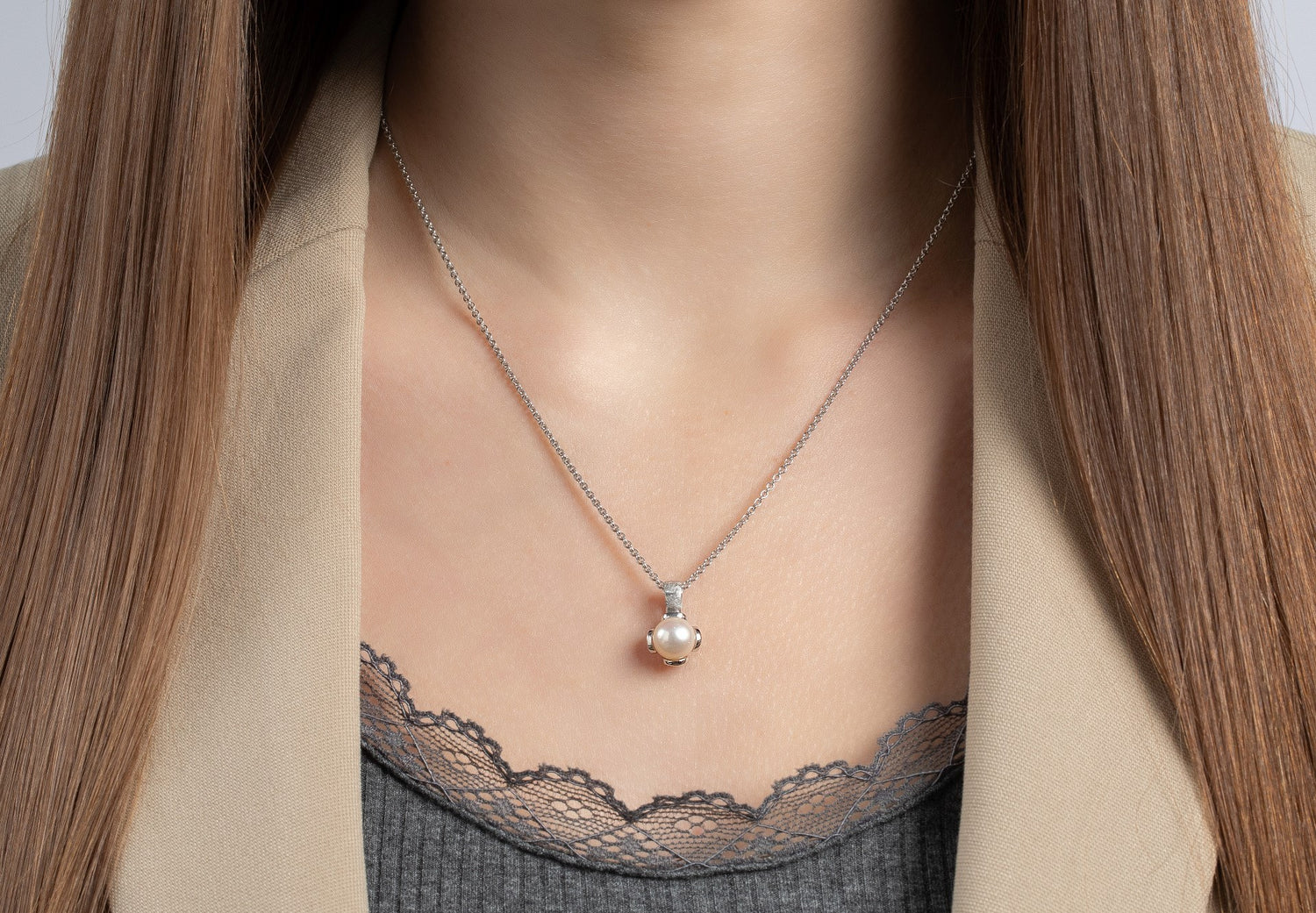 925/- Anhänger, rho. matt., Zuchtperle weiß 3,85ct