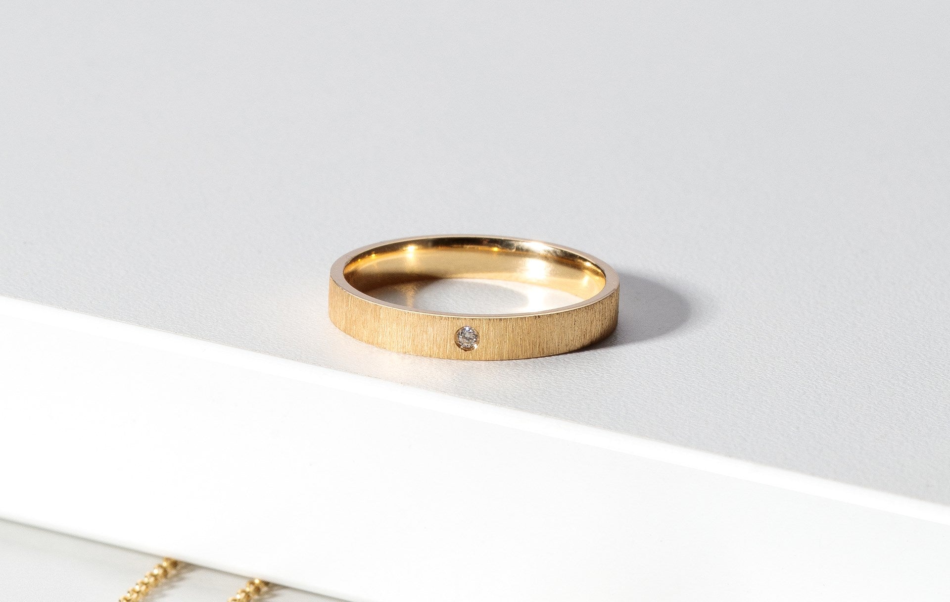 750/- ring satin/brushed, dia. 0,02ct W-SI