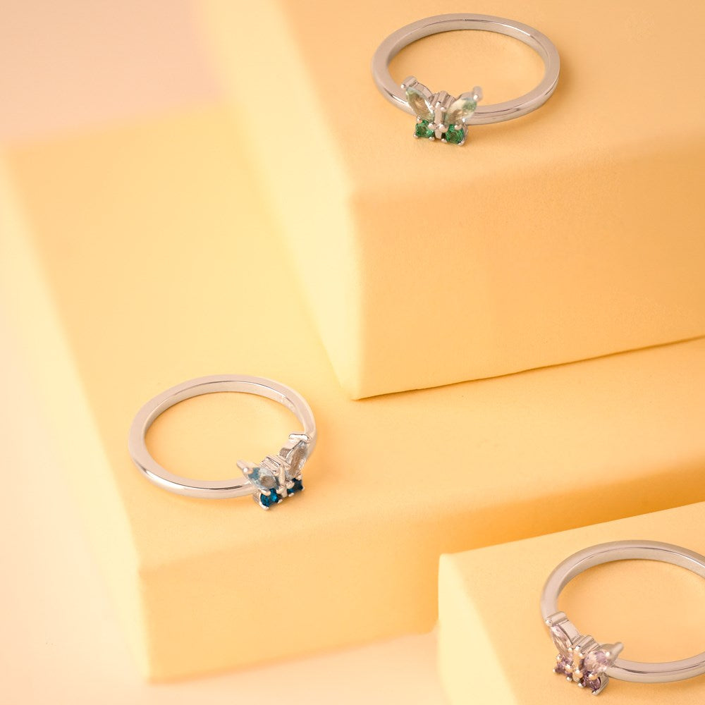 Rhd. silver ring w. butterfly green cz