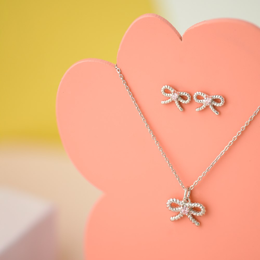 Rhodinierte Silber Halskette Schleife m. Rosa cz