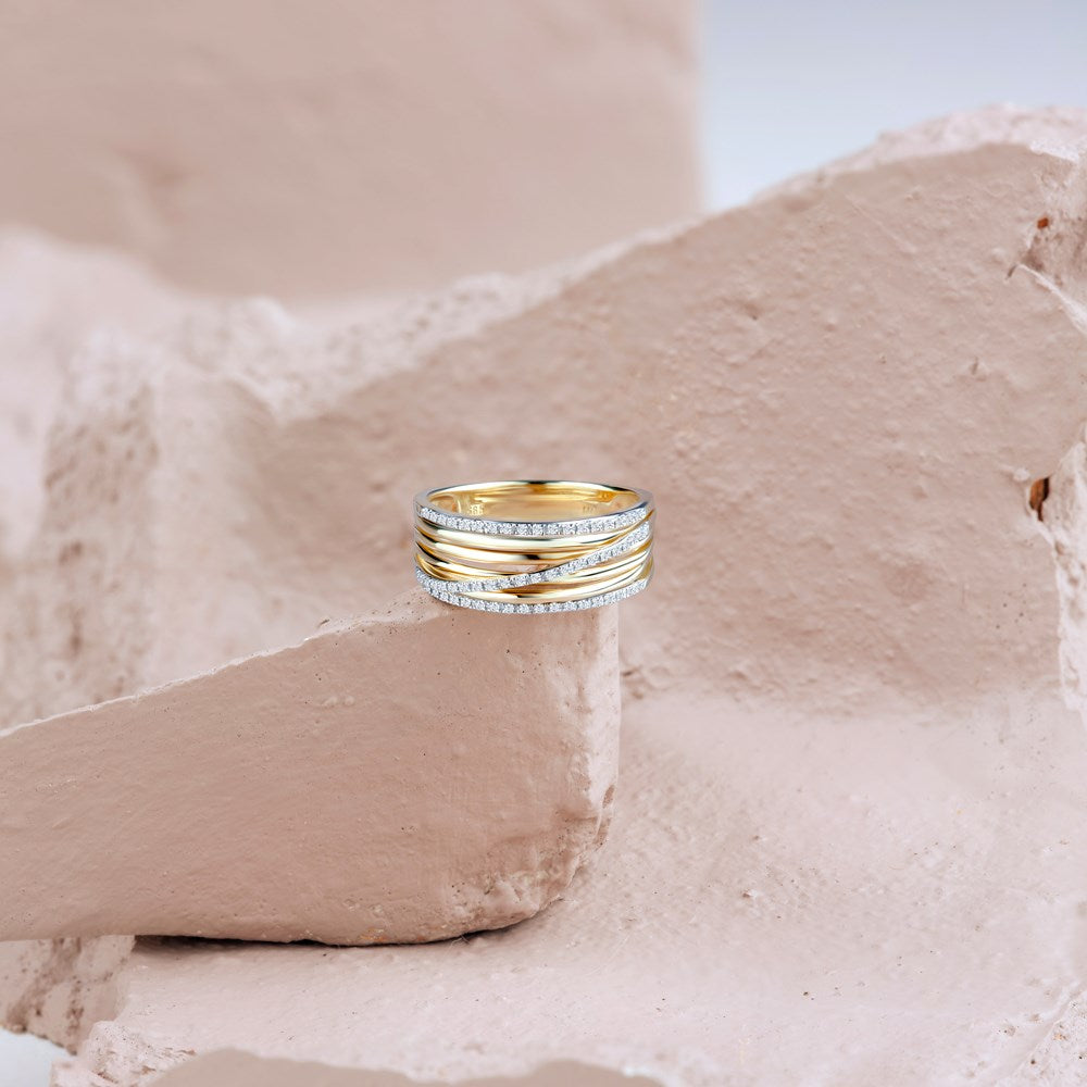 14kt. guldring med 0,16ct W/SI