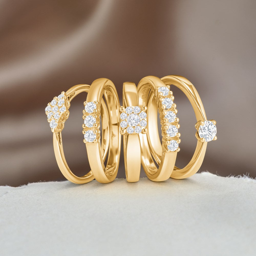 14kt. Allianzring m/dia. 3x0.05ct W/SI