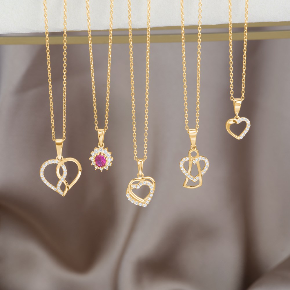 8ct. gold pendant roset w/synt. ruby and cz incl.