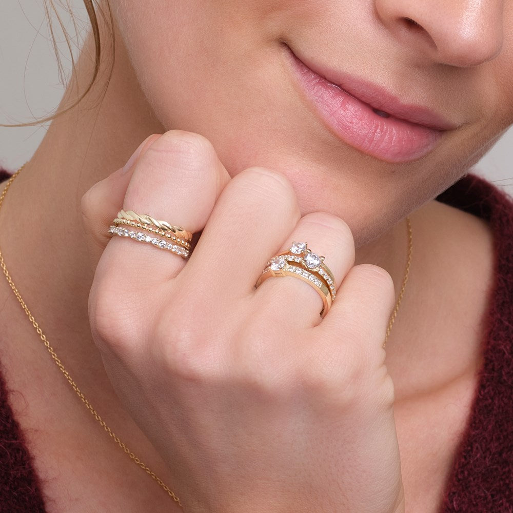 8kt. guldring m/cz i 4 grabber