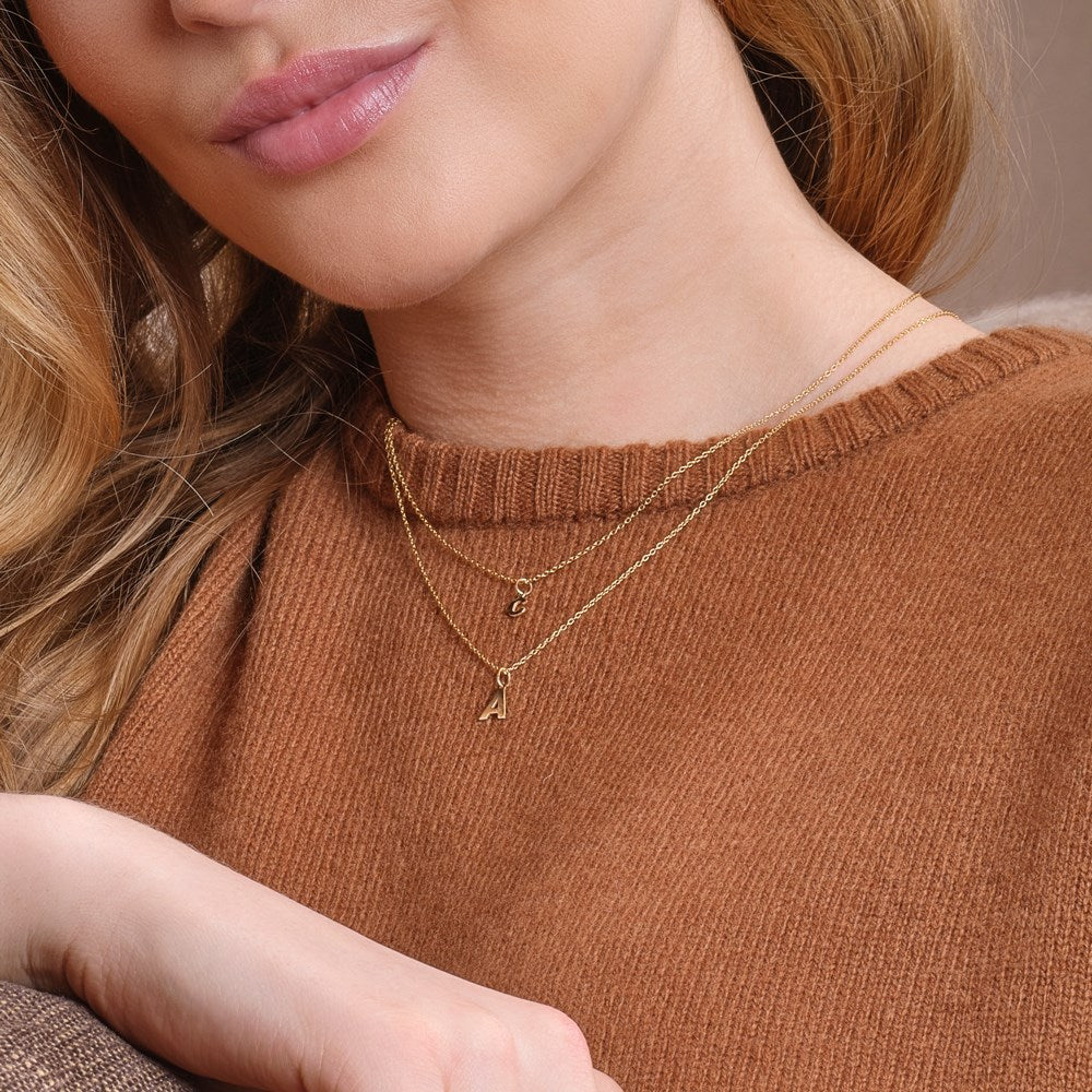 14 kt. gold pendant letter